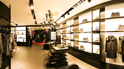 Image showing bright and fashionable interior of shoe store in modern mall