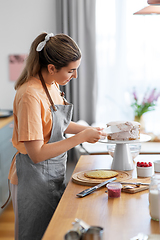 Image showing woman cooking food and baking on kitchen at home