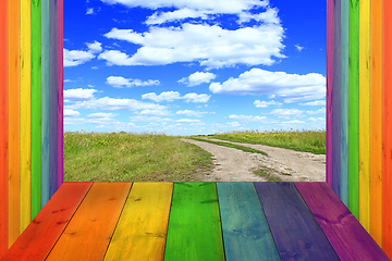 Image showing multicolored bright stand from wooden boards and sky