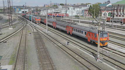 Image showing BARNAUL - AUGUST 22: Red passenger train on railway station on August 22, 2017 in Barnaul, Russia