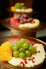 Image showing Plate with mixed fruits. Shallow dof.