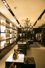 Image showing bright and fashionable interior of shoe store in modern mall