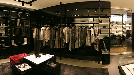 Image showing bright and fashionable interior of shoe store in modern mall