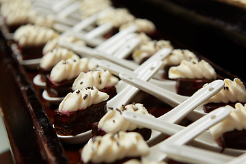 Image showing Canapes with dessert on the banquet table.