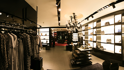 Image showing bright and fashionable interior of shoe store in modern mall