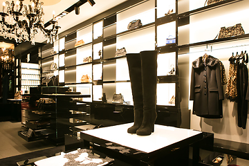 Image showing bright and fashionable interior of shoe store in modern mall