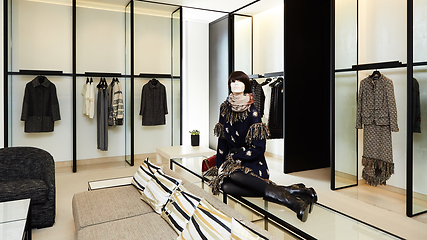 Image showing fashionable interior of boutique in modern mall.