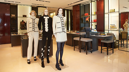 Image showing fashionable interior of boutique in modern mall.