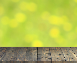 Image showing stand from wooden boards with green blurred image