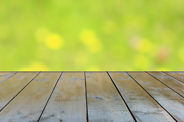 Image showing table from wooden boards with natural background