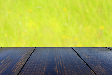 Image showing table from wooden boards with natural background