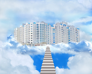 Image showing multistory modern house with leading stairs in the clouds