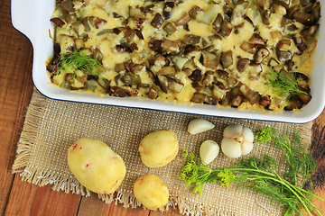 Image showing Baked potato with eggplant cheese and garlic