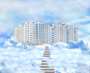 Image showing stairs leading to multistory modern house through clouds