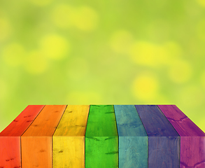 Image showing multicolored wooden boards with blurred lights