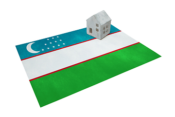 Image showing Small house on a flag - Uzbekistan