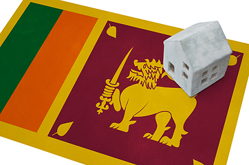 Image showing Small house on a flag - Sri Lanka