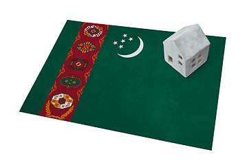 Image showing Small house on a flag - Turkmenistan