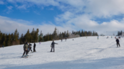 Image showing Blur panoramic view of sport resort for winter vacation. Skies with back light. Warm filter with original sun color tones