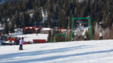 Image showing Blur panoramic view of sport resort for winter vacation. Skies with back light. Warm filter with original sun color tones