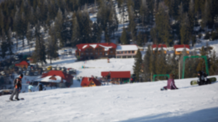 Image showing Blur panoramic view of sport resort for winter vacation. Skies with back light. Warm filter with original sun color tones