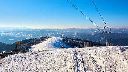 Image showing ski resort in early winter, waiting for snow surface lift on a background mountain valley