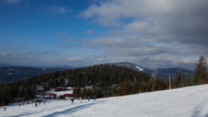 Image showing Blur panoramic view of sport resort for winter vacation. Skies with back light. Warm filter with original sun color tones