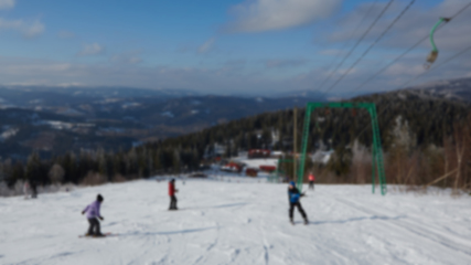 Image showing Blur panoramic view of sport resort for winter vacation. Skies with back light. Warm filter with original sun color tones