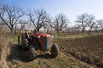 Image showing old tractor in a field