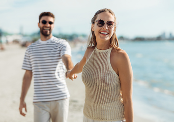 Image showing happy couple on summer beach