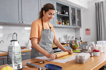 Image showing woman cooking food and baking on kitchen at home