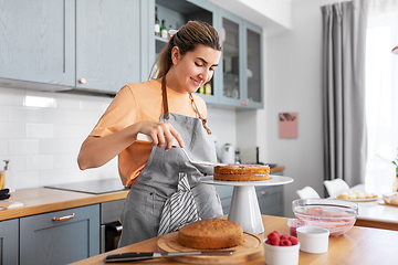 Image showing woman cooking food and baking on kitchen at home