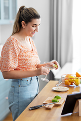 Image showing woman making cocktail drinks at home kitchen