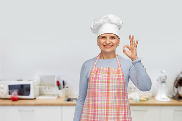 Image showing senior woman or chef in toque showing ok hand sign