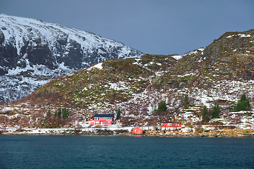 Image showing Red rorbu houses in Norway in winter