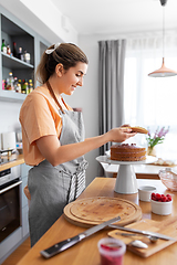 Image showing woman cooking food and baking on kitchen at home