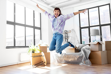 Image showing happy asian woman with stuff moving to new home