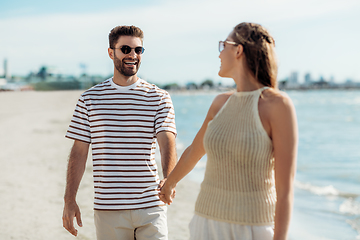 Image showing happy couple on summer beach