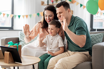 Image showing family with tablet pc has video call on birthday