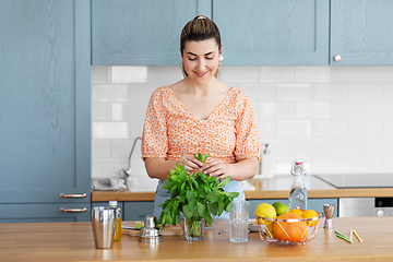 Image showing woman making cocktail drinks at home kitchen