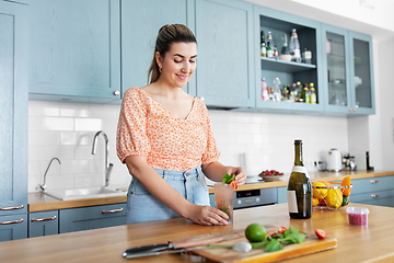 Image showing woman making cocktail drinks at home kitchen