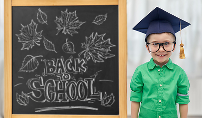 Image showing little student boy in bachelor hat or mortarboard