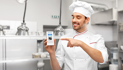 Image showing chef with virtual immunity passport on smartphone