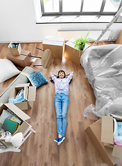 Image showing happy woman with boxes moving to new home