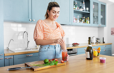 Image showing woman making cocktail drinks at home kitchen