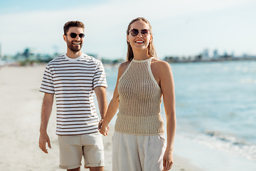 Image showing happy couple on summer beach