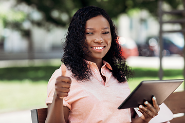 Image showing african american woman with tablet pc in city