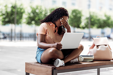 Image showing african student girl with laptop and books in city