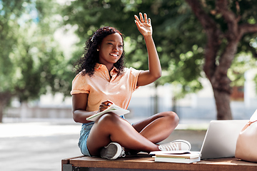 Image showing african student girl with laptop and books in city