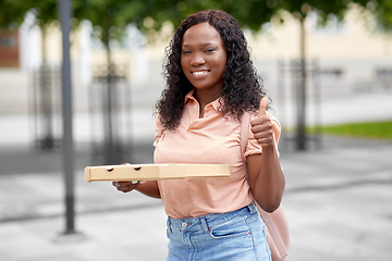 Image showing african student girl with pizza showing thumbs up